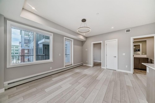 1218-6 Merganser Drive West, Chestermere, AB - Indoor Photo Showing Other Room