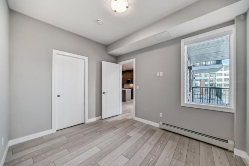 1218-6 Merganser Drive West, Chestermere, AB - Indoor Photo Showing Other Room