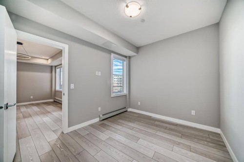 1218-6 Merganser Drive West, Chestermere, AB - Indoor Photo Showing Other Room