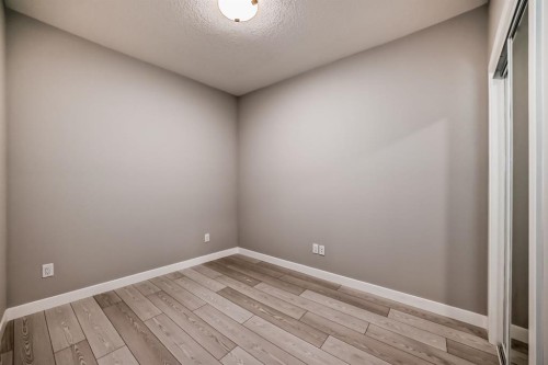 1218-6 Merganser Drive West, Chestermere, AB - Indoor Photo Showing Other Room