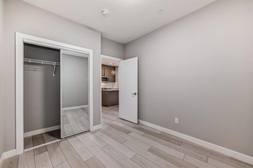 1218-6 Merganser Drive West, Chestermere, AB - Indoor Photo Showing Other Room