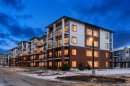 1218-6 Merganser Drive West, Chestermere, AB  - Outdoor With Facade 