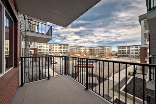 1218-6 Merganser Drive West, Chestermere, AB - Outdoor With Exterior