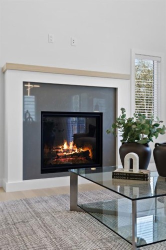 50 Westland Park Sw, Calgary, AB - Indoor Photo Showing Living Room With Fireplace