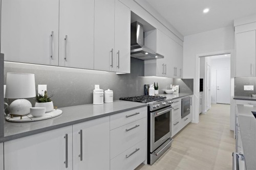 50 Westland Park Sw, Calgary, AB - Indoor Photo Showing Kitchen With Upgraded Kitchen