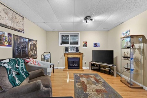 1163 Prairie Springs Hill Sw, Airdrie, AB - Indoor With Fireplace