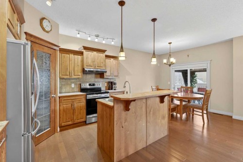 1163 Prairie Springs Hill Sw, Airdrie, AB - Indoor Photo Showing Kitchen