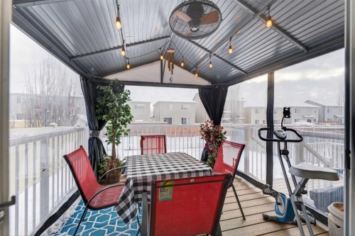 1163 Prairie Springs Hill Sw, Airdrie, AB - Outdoor With Deck Patio Veranda With Exterior