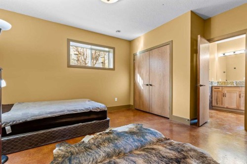 80 Cochrane Lake Trail, Cochrane Lake, AB - Indoor Photo Showing Bedroom