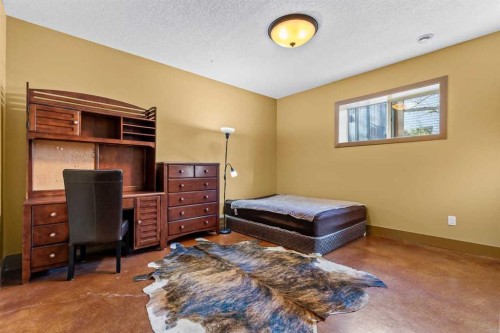 80 Cochrane Lake Trail, Cochrane Lake, AB - Indoor Photo Showing Bedroom