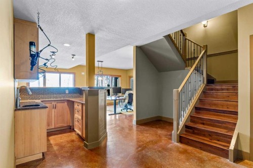 80 Cochrane Lake Trail, Cochrane Lake, AB - Indoor Photo Showing Other Room