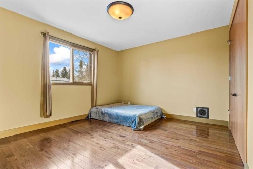 80 Cochrane Lake Trail, Cochrane Lake, AB - Indoor Photo Showing Bedroom