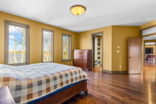80 Cochrane Lake Trail, Cochrane Lake, AB - Indoor Photo Showing Bedroom
