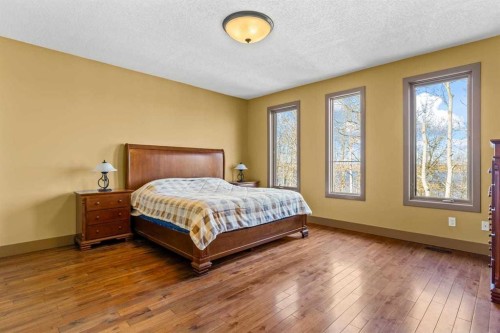 80 Cochrane Lake Trail, Cochrane Lake, AB - Indoor Photo Showing Bedroom