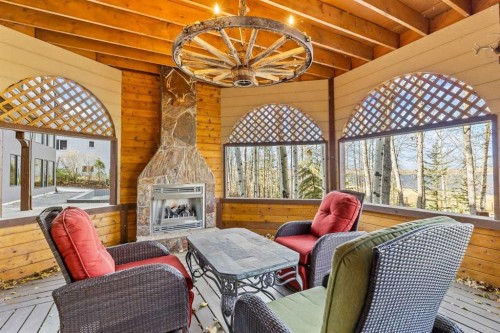80 Cochrane Lake Trail, Cochrane Lake, AB - Indoor With Fireplace
