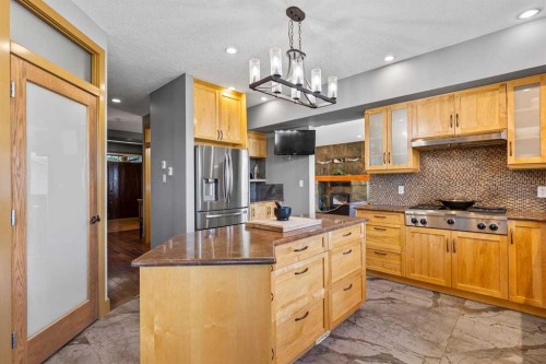 80 Cochrane Lake Trail, Cochrane Lake, AB - Indoor Photo Showing Kitchen