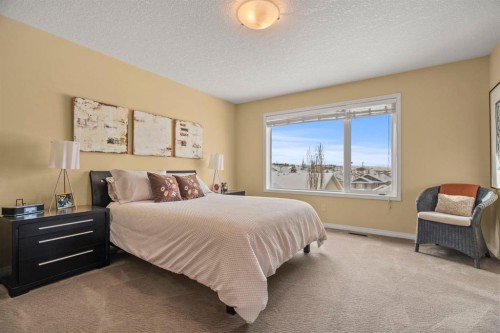 153 Crestridge Way Sw, Calgary, AB - Indoor Photo Showing Bedroom