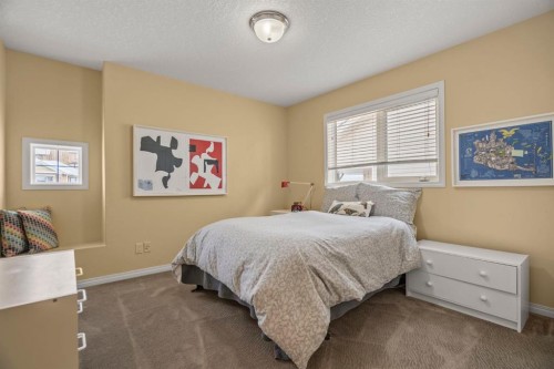 153 Crestridge Way Sw, Calgary, AB - Indoor Photo Showing Bedroom