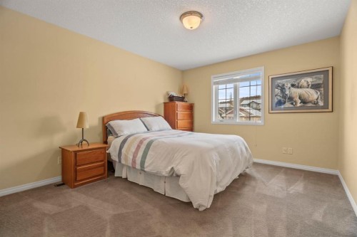153 Crestridge Way Sw, Calgary, AB - Indoor Photo Showing Bedroom