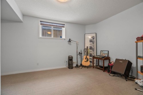 153 Crestridge Way Sw, Calgary, AB - Indoor Photo Showing Other Room