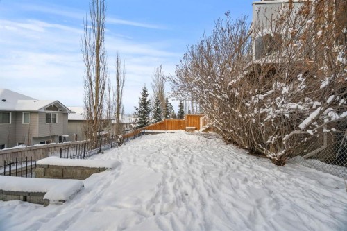 153 Crestridge Way Sw, Calgary, AB - Outdoor