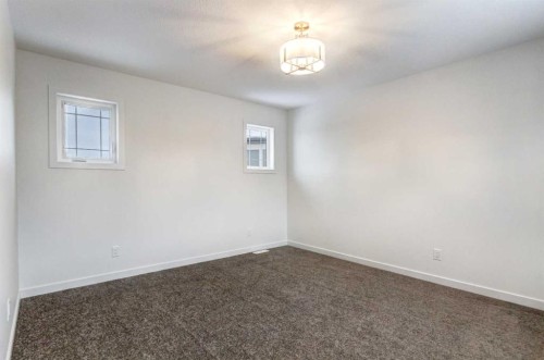 9 Magnolia Path Se, Calgary, AB - Indoor Photo Showing Other Room