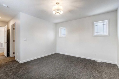 9 Magnolia Path Se, Calgary, AB - Indoor Photo Showing Other Room