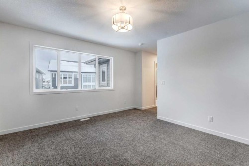 9 Magnolia Path Se, Calgary, AB - Indoor Photo Showing Other Room