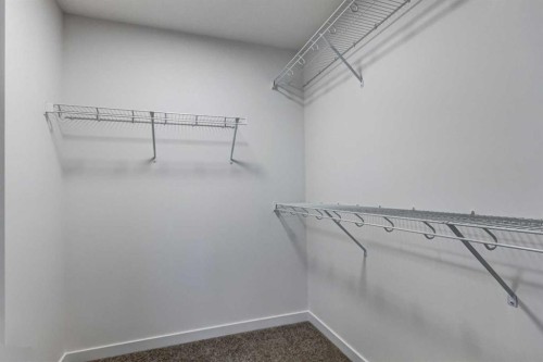 9 Magnolia Path Se, Calgary, AB - Indoor With Storage