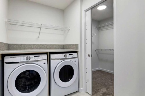 9 Magnolia Path Se, Calgary, AB - Indoor Photo Showing Laundry Room