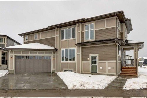 9 Magnolia Path Se, Calgary, AB - Outdoor With Facade
