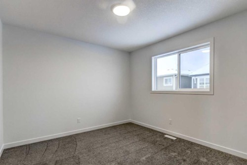 9 Magnolia Path Se, Calgary, AB - Indoor Photo Showing Other Room