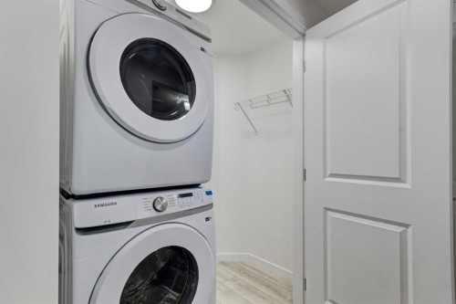 9 Magnolia Path Se, Calgary, AB - Indoor Photo Showing Laundry Room