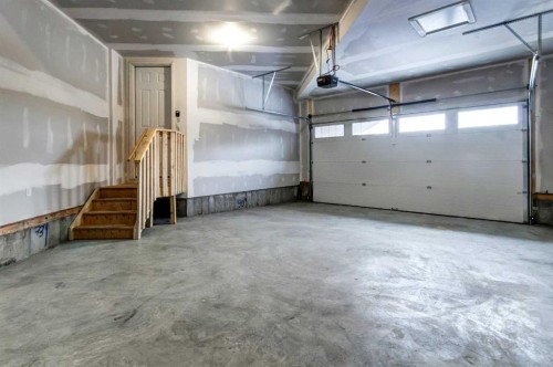 9 Magnolia Path Se, Calgary, AB - Indoor Photo Showing Garage