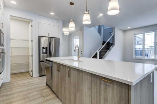 9 Magnolia Path Se, Calgary, AB - Indoor Photo Showing Kitchen With Upgraded Kitchen