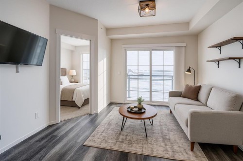 3409-298 Sage Meadows Park Nw, Calgary, AB - Indoor Photo Showing Living Room