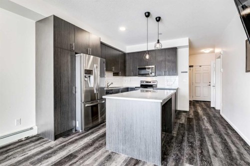 3409-298 Sage Meadows Park Nw, Calgary, AB - Indoor Photo Showing Kitchen With Stainless Steel Kitchen With Upgraded Kitchen