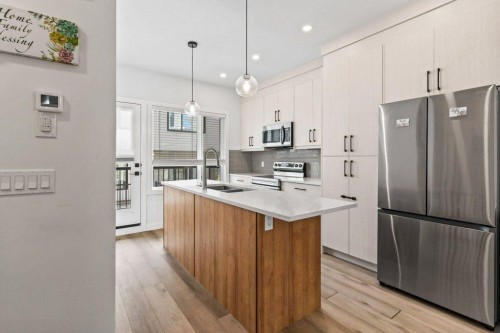 343 Sage Hill Rise Nw, Calgary, AB - Indoor Photo Showing Kitchen With Stainless Steel Kitchen With Double Sink With Upgraded Kitchen
