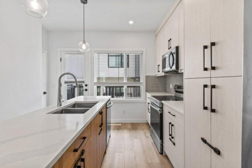 343 Sage Hill Rise Nw, Calgary, AB - Indoor Photo Showing Kitchen With Double Sink With Upgraded Kitchen