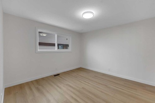 19 Cedargrove Place Sw, Calgary, AB - Indoor Photo Showing Other Room