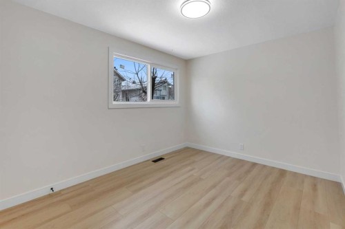 19 Cedargrove Place Sw, Calgary, AB - Indoor Photo Showing Other Room