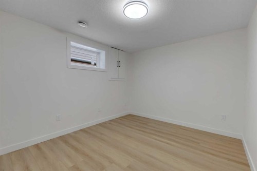 19 Cedargrove Place Sw, Calgary, AB - Indoor Photo Showing Other Room