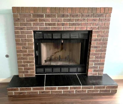 6946 Laguna Way Ne, Calgary, AB - Indoor With Fireplace