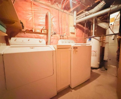 6946 Laguna Way Ne, Calgary, AB - Indoor Photo Showing Laundry Room