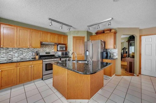 166 Somerset Drive Sw, Calgary, AB - Indoor Photo Showing Kitchen With Stainless Steel Kitchen With Double Sink