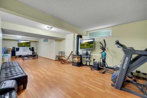 166 Somerset Drive Sw, Calgary, AB - Indoor Photo Showing Gym Room