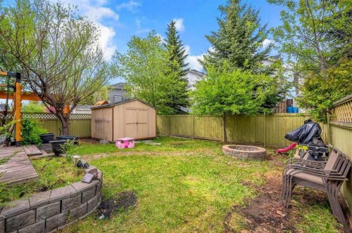 166 Somerset Drive Sw, Calgary, AB - Outdoor With Backyard
