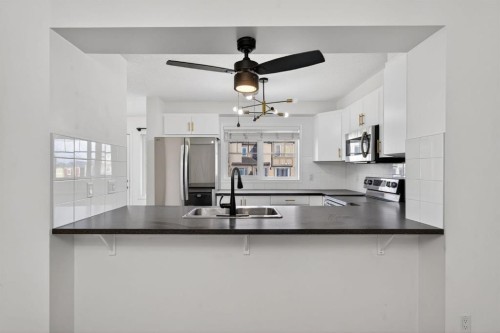 213 Cityscape Lane Ne, Calgary, AB - Indoor Photo Showing Kitchen With Double Sink With Upgraded Kitchen