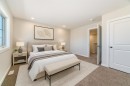 288 Rangeview Way Se, Calgary, AB  - Indoor Photo Showing Bedroom 
