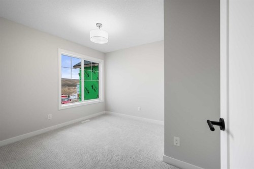 26 Walgrove Bay Se, Calgary, AB - Indoor Photo Showing Other Room